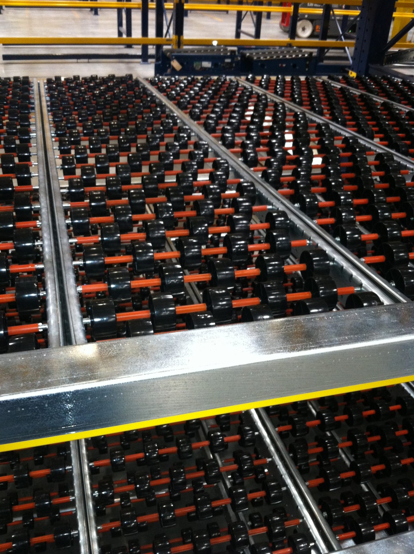 Carton Flow Rack beams and storage arrangement